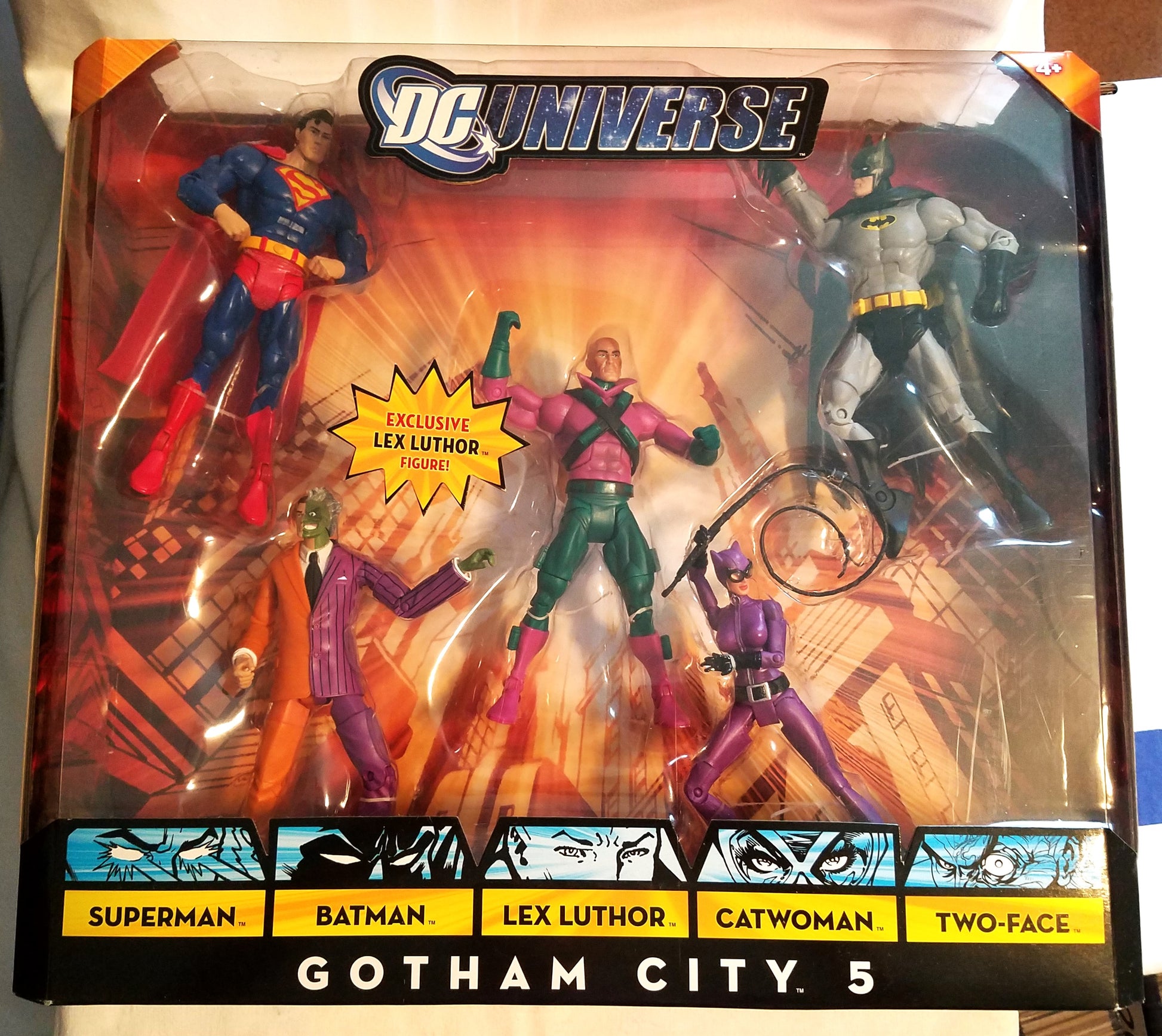 DC Universe Gotham City 5 action figure set in its original window box packaging, featuring Superman, Batman, Lex Luthor, Catwoman, and Two-Face.